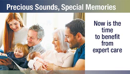 A multigenerational family, including grandparents, parents, and children, sit together on a couch smiling and reading a book. Text reads: Precious Sounds, Special Memories. Now is the time to benefit from expert care.